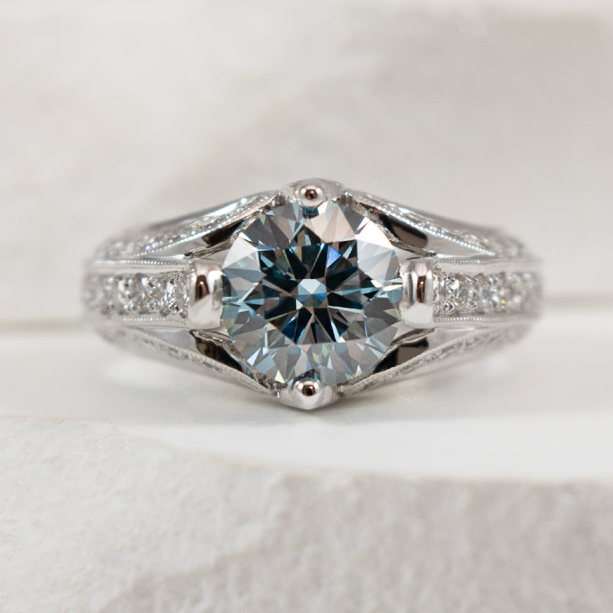 14KW Fancy Blue Diamond Engagement Ring 

14K White Gold Fancy Intense Blue Lab Grown Diamond Accented Engagement Ring  

Center - 1.91 Carat Fancy Intense Blue Lab Grown Round Brilliant Cut Diamond of VS2 Clarity, Ideal/ Excellent/ Excellent Cut