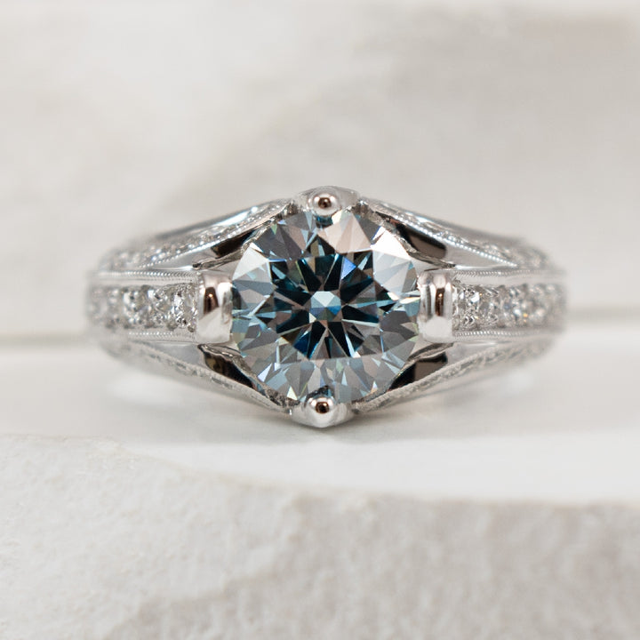 14KW Fancy Blue Diamond Engagement Ring 

14K White Gold Fancy Intense Blue Lab Grown Diamond Accented Engagement Ring  

Center - 1.91 Carat Fancy Intense Blue Lab Grown Round Brilliant Cut Diamond of VS2 Clarity, Ideal/ Excellent/ Excellent Cut