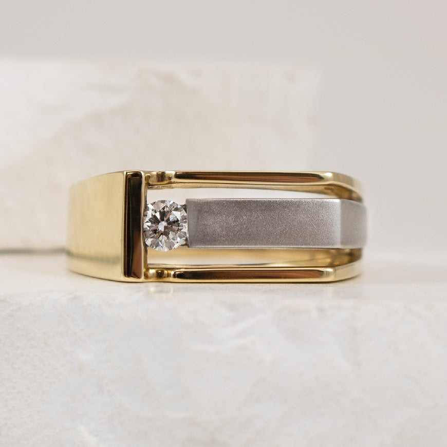 10K Two Tone Gold Diamond Men's Ring              

10K Yellow & White Gold Natural Diamond Ring

0.20 Total Diamond Weight I2-3 Clarity, HI Colour

Finger Size 10

