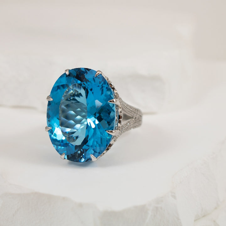 18KW 34.31CT Oval Cut Blue Topaz & Diamond Ring    

18K White Gold Blue Topaz & Diamond Ring

34.31 Carat of Natural Oval Cut Blue Topaz 
1.72 Total Natural Diamond Weight SI1 Clarity, GH Colour

Finger Size 7.5

