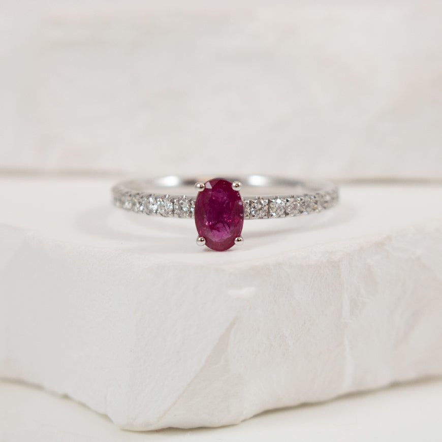 14KW Classic Oval Cut Ruby & Diamond Ring         

14K White Gold Oval Cut Ruby & Natural Diamond Ring

6x4mm Oval Cut Ruby

0.28 Total Natural Diamond Weight

Finger Size 7
