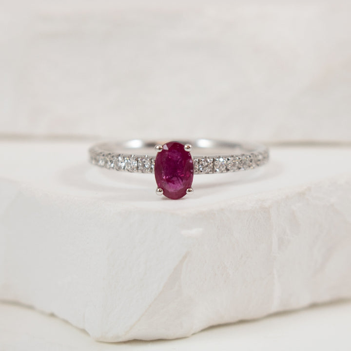 14KW Classic Oval Cut Ruby & Diamond Ring         

14K White Gold Oval Cut Ruby & Natural Diamond Ring

6x4mm Oval Cut Ruby

0.28 Total Natural Diamond Weight

Finger Size 7
