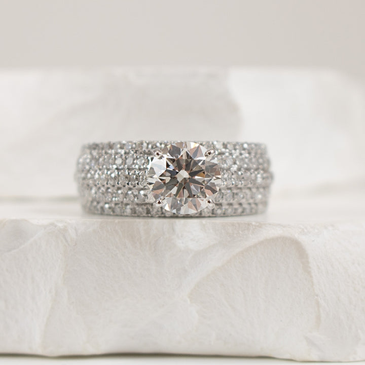 14KW 1.50 Carat Wide Diamond Engagement Ring          

14K White Gold Lab Grown & Natural Wide Diamond Engagement Ring 

Center - 1.50 Carat Round Birlliant Cut Lab Grown Diamond of VVS2 Clarity, F Colour, Ideal/ Excellent/ Excellent Cut, IGI Ce
