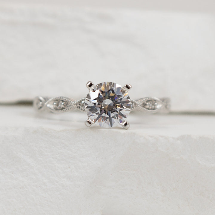 14KW Vintage Diamond Milgrain & Engraved Ring Setting

14K White Gold Gabriel & Co. Vintage Diamond Accented Milgrain & Engraved Ring Setting

Center - To Hold 1.00 Carat Round Brilliant Cut Diamond

Accent - 0.12 Carats Natural Diamonds SI2+ C