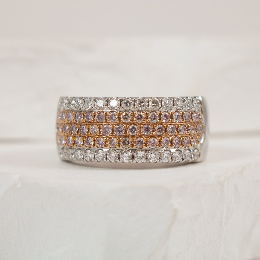18KW/R Pink & White Diamond Ring             

18K White & Rose Gold Roman & Jules Natural Diamond Ring

0.65 Total Untreated Pink Diamond Weight
0.51 Total Diamond Weight SI1-2 Clarity, GH Colour
1.16 Total Natural Diamond Weight

Finger Siz