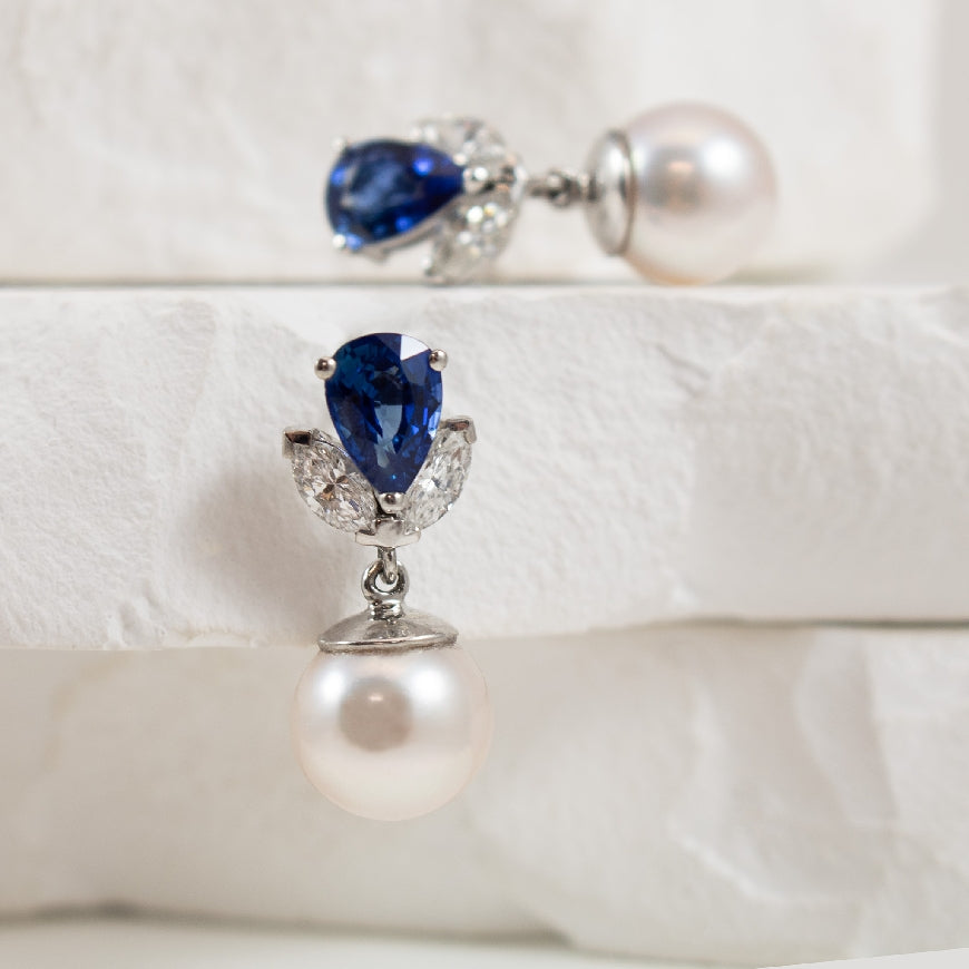 14KW Sapphire & Diamond & Akoya Pearl Earrings    

14K White Gold Sapphire & Diamond & Akoya Pearl Drop Earrings 

1.80 Total Sapphire Weight 

0.60 Total Natural Diamond Weight  VS/SI Clarity, GH Colour, Very Good Cut 

Earring Closure Post