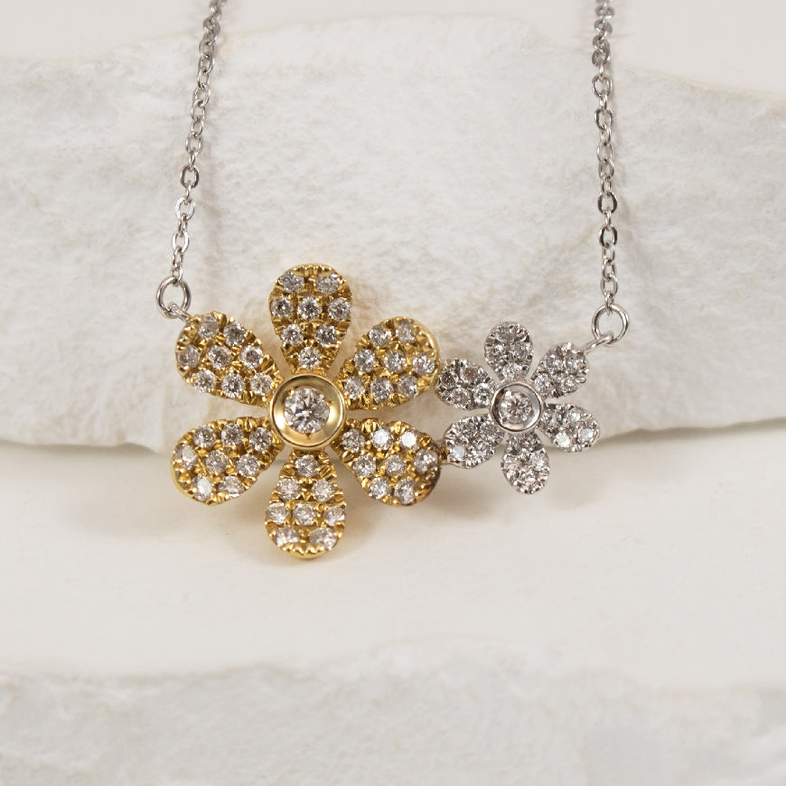 14K Two Tone Diamond Flower Necklace              

14K White & Yellow Gold Bassali Natural Diamond Flower Necklace

0.26 Total Natural Diamond Weight 

Chain Length 18' (adjustable to 17' and 16')

