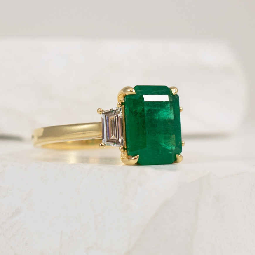 18KY Emerald & Diamond Three Stone Ring