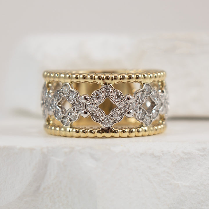 14K Two Tone Wide Diamond Ring                     

14K Yellow & White Gold Natural Diamond Ring

0.82 Total Natural Diamond Weight I1-2 Clarity, GH Colour

Finger Size 6.5

