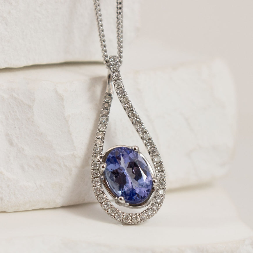 14KW Tanzanite & Diamond Necklace                 

14K White Gold Tanzanite & Diamond Necklace

0.81 Carat Tanzanite 

0.16 Total Natural Diamond Weight 

Chain Length 18'





