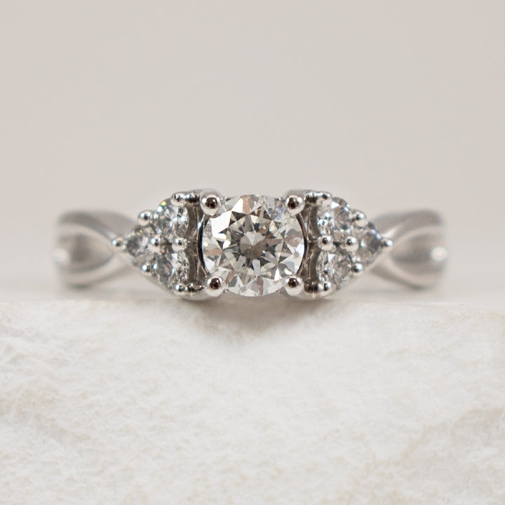 19K White Gold Canadian Diamond Accented Ring 

0.446 Carat of Round Brilliant Cut Canadian Diamond of I1 Clarity, H Colour

0.696 Total Natural Diamond Weight 

Band Width 2mm

Finger Size