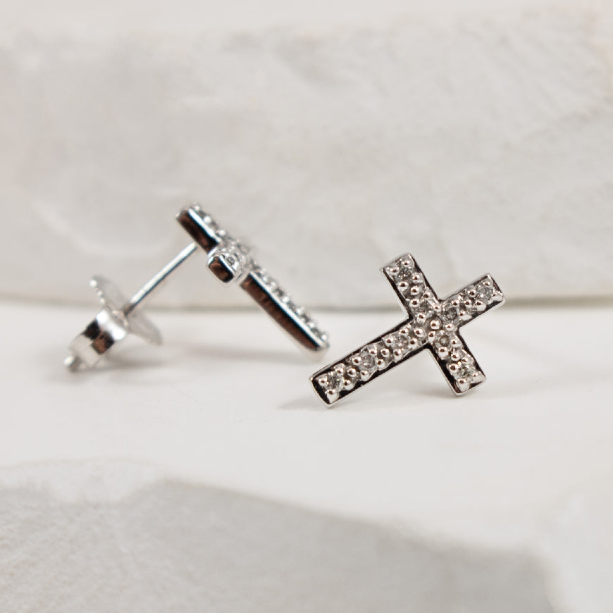 10K White Gold Natural Diamond Cross Earrings 

0.10 Total Natural Diamond Weight of I1 Clarity, IJ Colour

Earring Closure Post with Butterfly Back 
