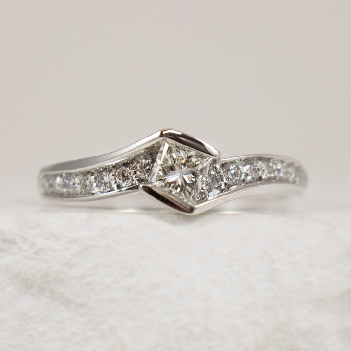 14K White Gold Canadian Diamond Accented Ring

0.30 Carat od Round Brilliant Cut Canadian Diamond of I1 Clarity, I Colour

0.20 Total Natural Diamond Weight 

Band Width 1.8mm

Finger Size 6.5