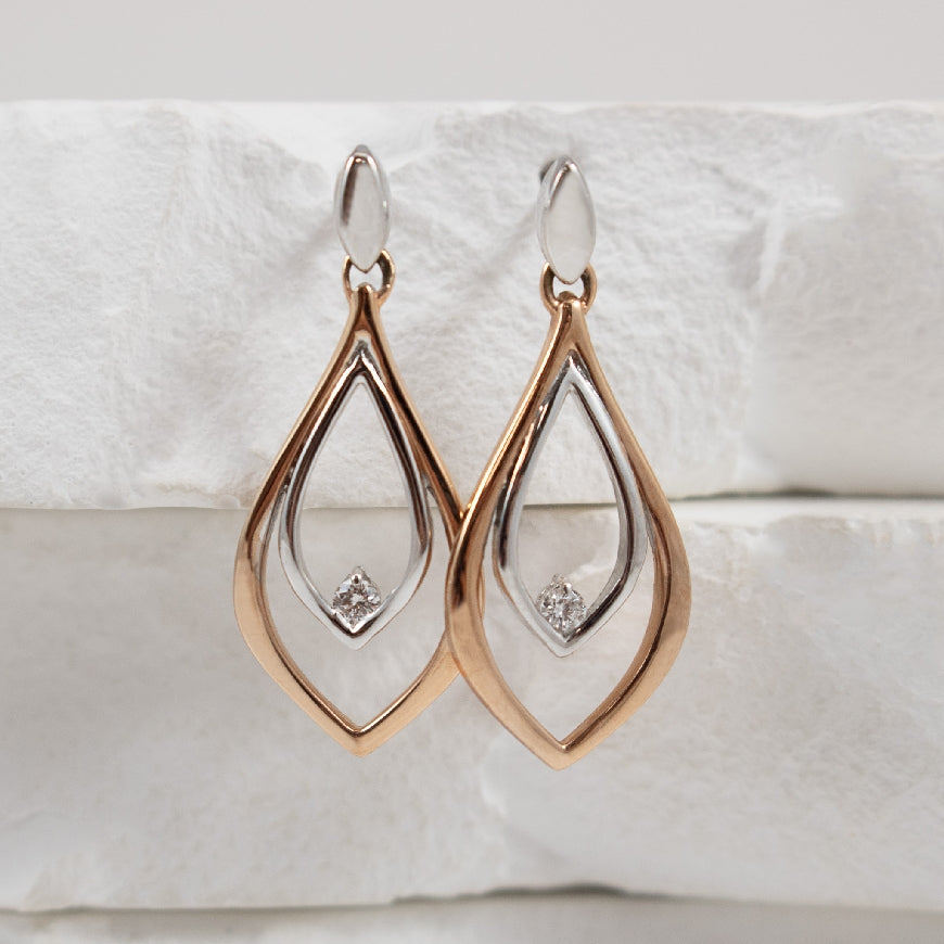 14K White & Rose Gold Natural Canadian Diamond Earrings 

0.04 Total Natural Diamond Weight of SI2 Clarity, G Colour

Earring Closure Post with Butterfly Back 


