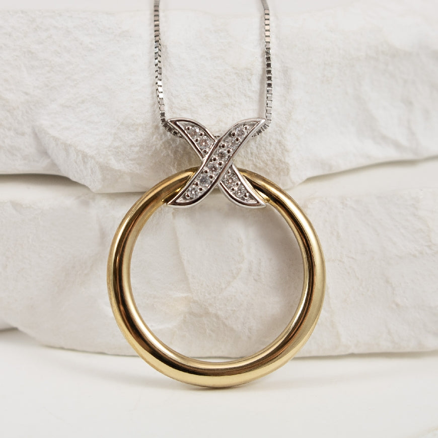 10K White & Yellow Natural Diamond 'XO' Necklace 

0.073 Total Natural Diamond Weight 
