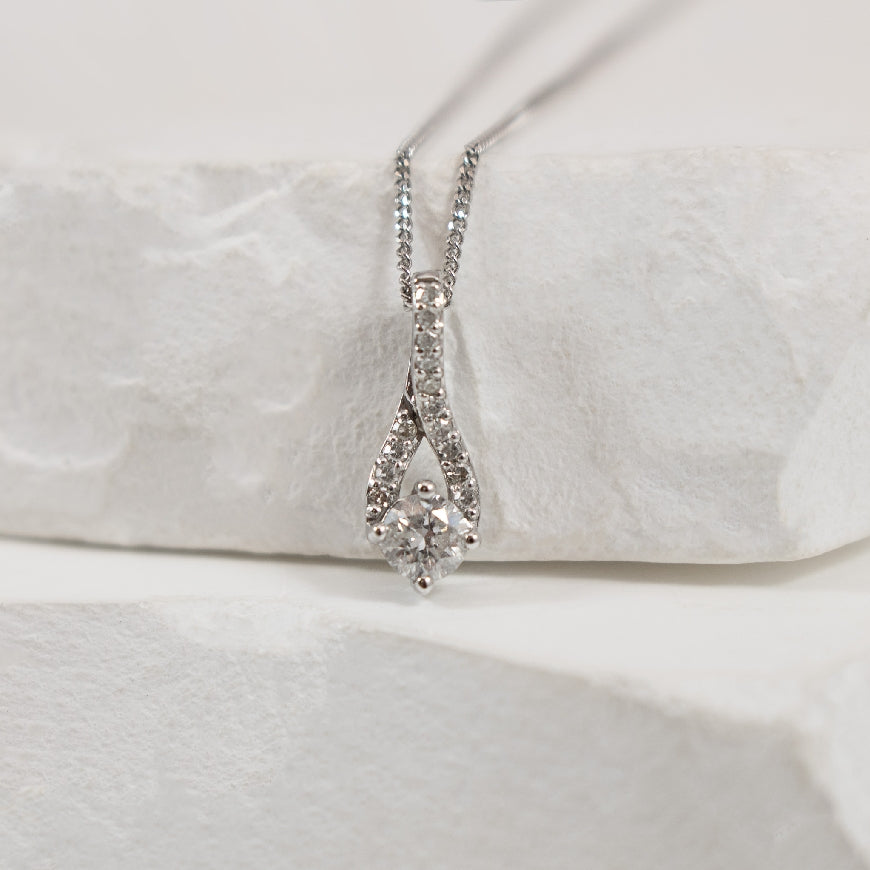 10K White Gold Petite Natural Diamond Necklace 

0.16 Total Natural Diamond Weight of I1 Clarity, HI Colour 

Chain Length 


