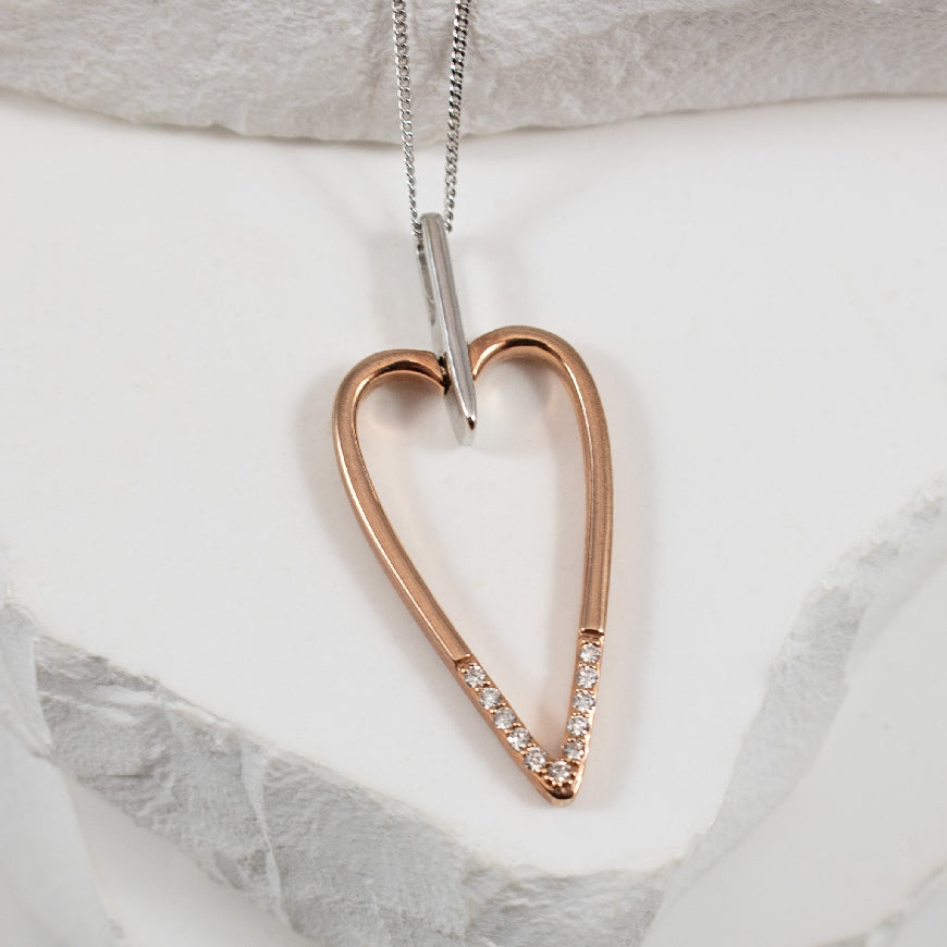 10K Rose & White Gold Natural Diamond Heart Necklace 

0.06 Total Natural Diamond Weight 

