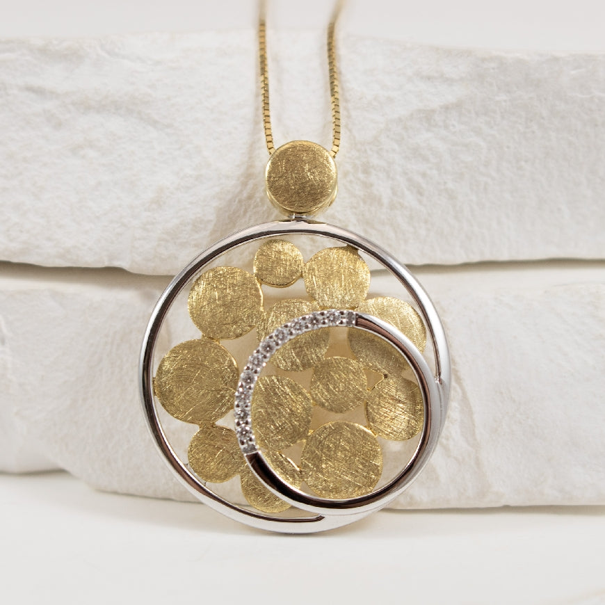 14K Two Tone Brushed Gold Diamond Circle Necklace 

14K Two Tone Brushed Gold Natural Diamond Circle Necklace 

0.06 Total Natural Diamond Weight 

Chain Length 18'

