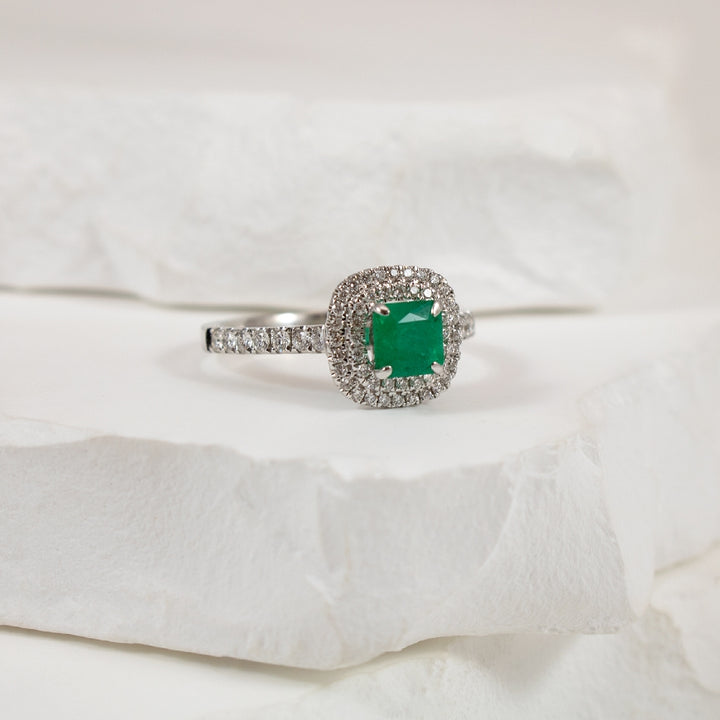 18KW Emerald & Diamond Double Halo Ring             

18K White Gold Emerald & Natural Diamond Halo Ring

0.61 Carat Princess Cut Emerald
0.38 Total Natural Diamond Weight SI Clarity, GH Colour

Finger Size 6.5

