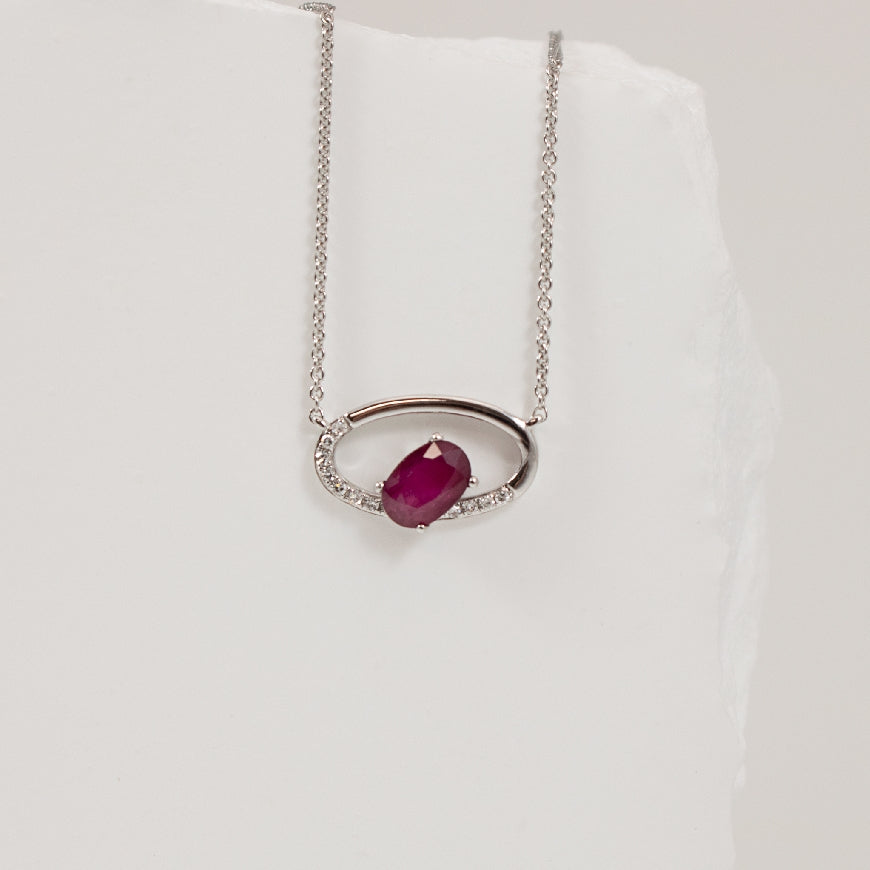 14KW Open Oval Ruby & Diamond Necklace            

14K White Gold Oval Cut Ruby & Natural Diamond Necklace

0.03 Total Natural Diamond Weight I1 Clarity, GH Colour

Chain Length 16'

