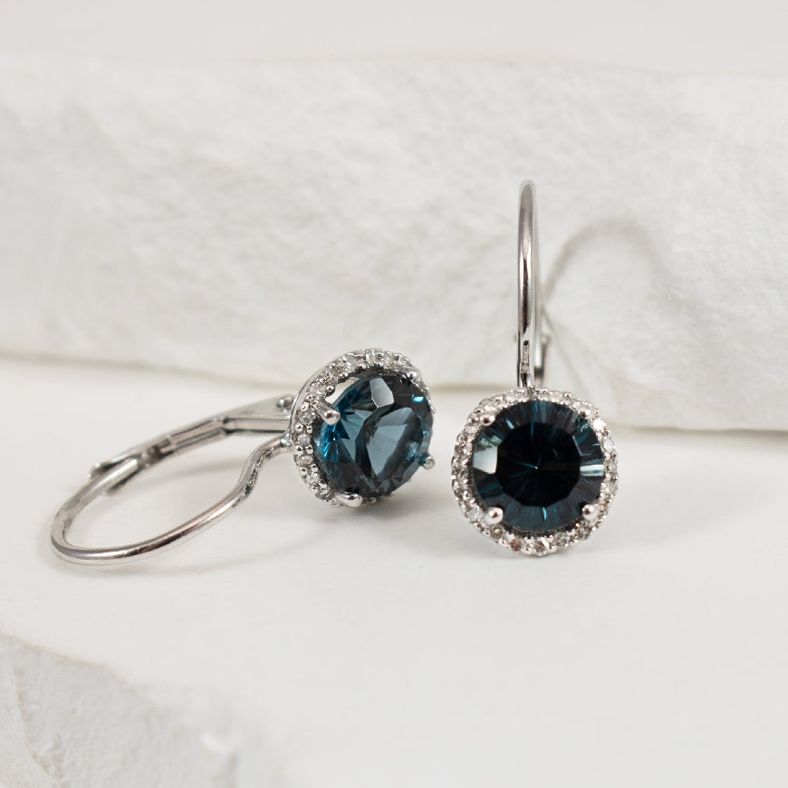 10KW London Blue Topaz & Diamond Halo Earrings    

10K White Gold London Blue Topaz & Diamond Halo Earrings 

0.11 Total Natural Diamond Weight 

Earring Closure Leverback 


