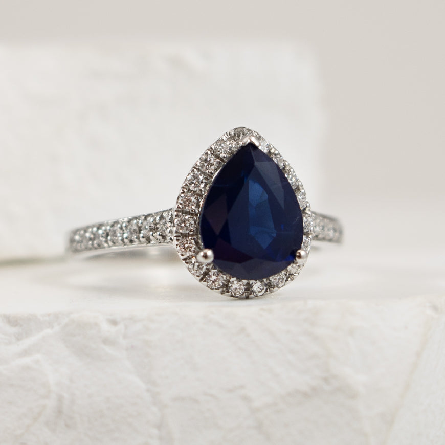14KW Pear Shaped Sapphire & Diamond Halo Ring     

14K White Gold Pear Shaped Sapphire & Diamond Halo Ring 

0.23 Total Natural Diamond Weight 

Finger Size 6.5 
