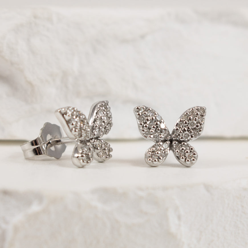 10KW Diamond Butterfly Stud Earrings              

10K White Gold Natural Diamond Butterfly Earrings

0.20 Total Natural Diamond Weight 

Earring Closure Post with Butterfly Back

