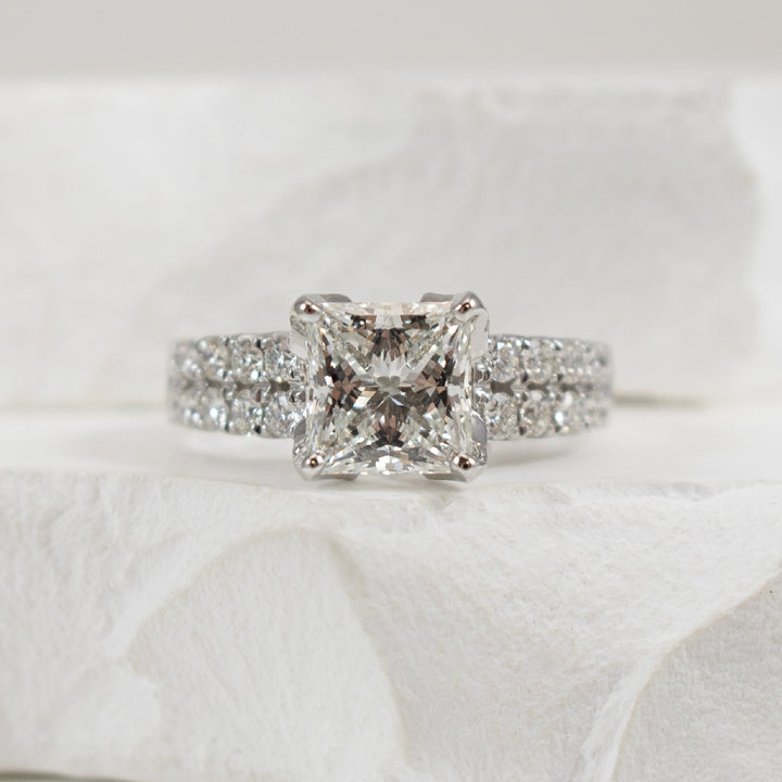 14KW 2.01CT Princess Cut Diamond Engagement Ring  

14K White Gold Princess Cut Lab Grown & Natural Diamond Engagement Ring  
         
Center - 2.01 Carat Princess Cut Lab Grown Diamond of VS1 Clarity, E Colour, Excellent/ Excellent Cut, IGI Cer