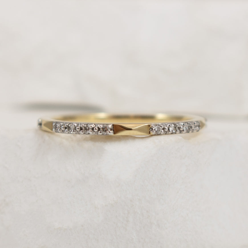 10KY Spaced Diamond Band                          

10K Yellow Gold Natural Spaced Diamond Band 

0.10 Total Natural Diamond Weight 

Finger Size 6.5

