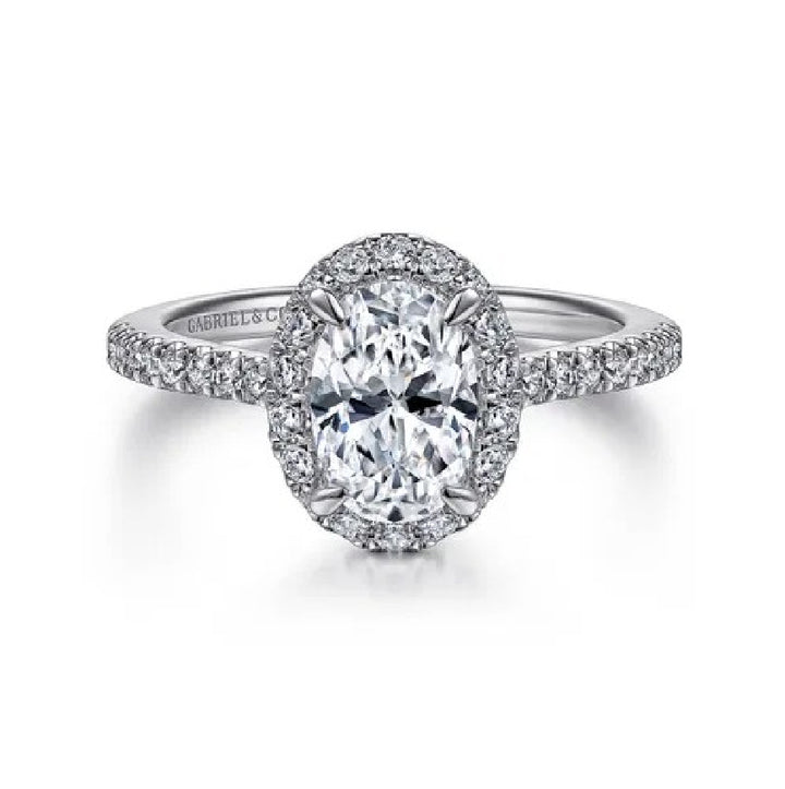 14K White Gold Gabriel & Co. Diamond Accented Ring Setting  

Center - To Hold a 8x5.5mm Oval Cut Diamond 

Accent - 0.33 Carats SI2+ Clarity, G-H Colour 

Band Width 1.6mm

Finger Size 6.25

*Price for ring only. This ring can be set with 