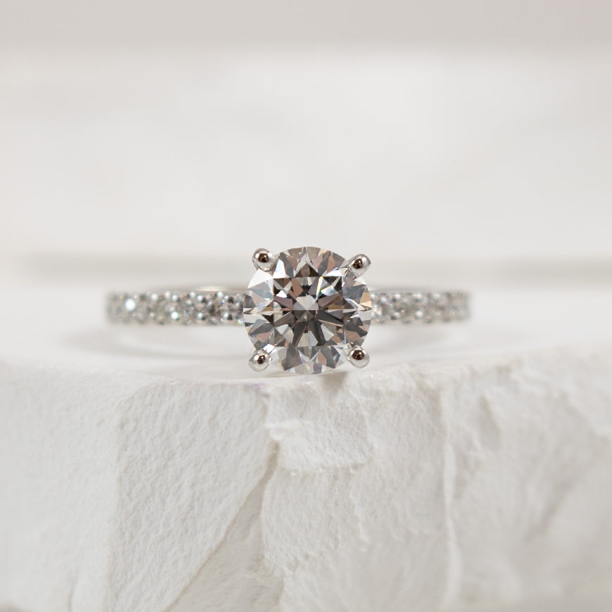 14KW Gabriel & Co. Diamond Engagement Ring        

14K White Gold Gabriel & Co. Lab Grown & Natural Diamond Accented Engagement Ring 

Center - 1.13 Carat Round Brilliant Cut Lab Grown Diamond of VS2 Clarity, E Colour, Ideal/ Excellent/ Excellen