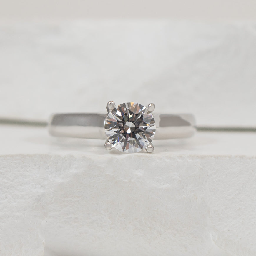 14KW Gabriel & Co. Solitaire Engagement Ring           

14K White Gold Gabriel & Co. Lab Grown Diamond Solitaire Engagement Ring 

Center - 1.32 Carat Round Brilliant Cut Lab Grown Diamond of VVS2 Clarity, E Colour, Ideal/ Excellent/ Excellent C