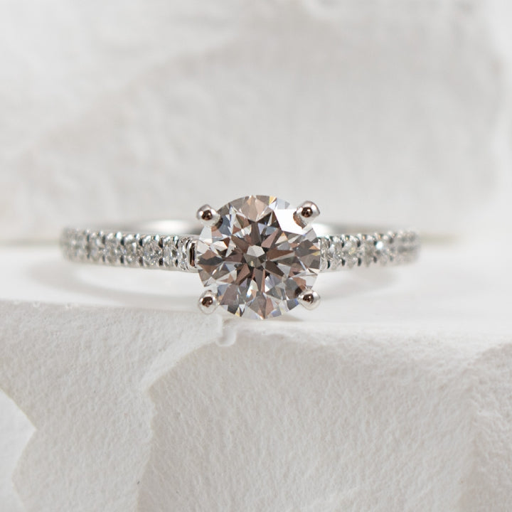 14KW Gabriel & Co. Diamond Engagement Ring       

14K White Gold Gabriel & Co. Lab Grown & Natural Diamond Accented Engagement Ring 

Center - 1.12 Carat Round Brilliant Cut Lab Grown Diamond of VS1 Clarity, E Colour, Ideal/ Excellent/ Excellent