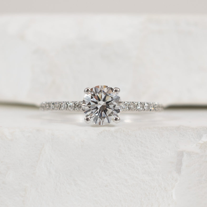 14KW 0.71CT Round Diamond Engagement Ring        

14K White Gold Roman & Jules Lab Grown & Natural Diamond Accented Engagement Ring 

Center - 0.71 Carat Round Brilliant Cut Lab Grown Diamond of  VS2 Clarity, D Colour, Excellent/Excellent/Very G