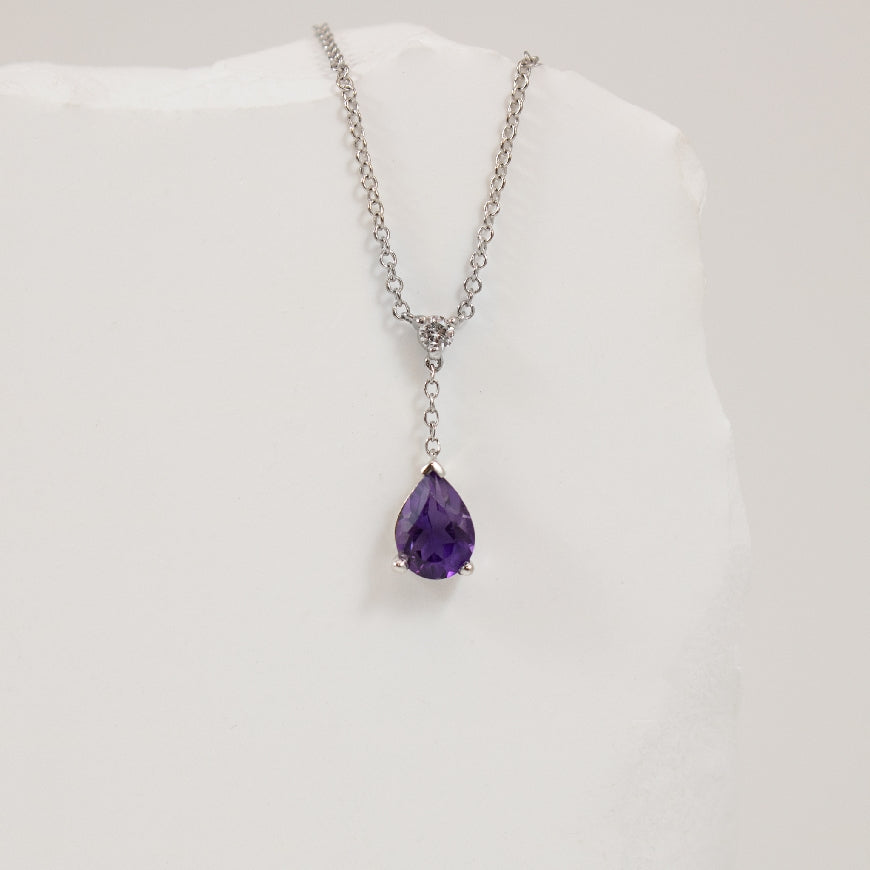 10KW Amethyst & Canadian Diamond Drop Necklace    

10K White Gold Amethyst & Natural Canadian Diamond Necklace

0.04 Total Natural Canadian Diamond Weight SI1 Clarity, G Colour

Chain Length 18' (Adjustable to 17'+16')

