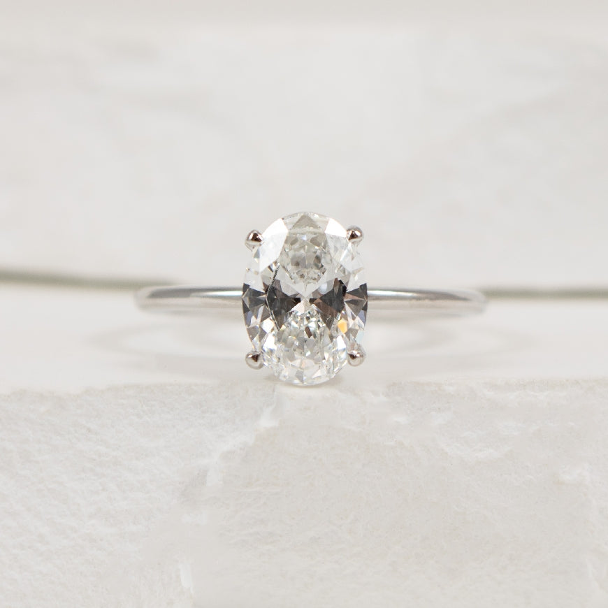 14KW 1.50CT Oval Solitaire Diamond Engagement Ring

14K White Gold Lab Grown Diamond Oval Cut Solitaire Engagement Ring 

Center - 1.50 Carat Oval Cut Lab Grown Diamond of SI1 Clarity, E Colour, Excellent Cut 

Band Width 1.3mm

Finger Size 6