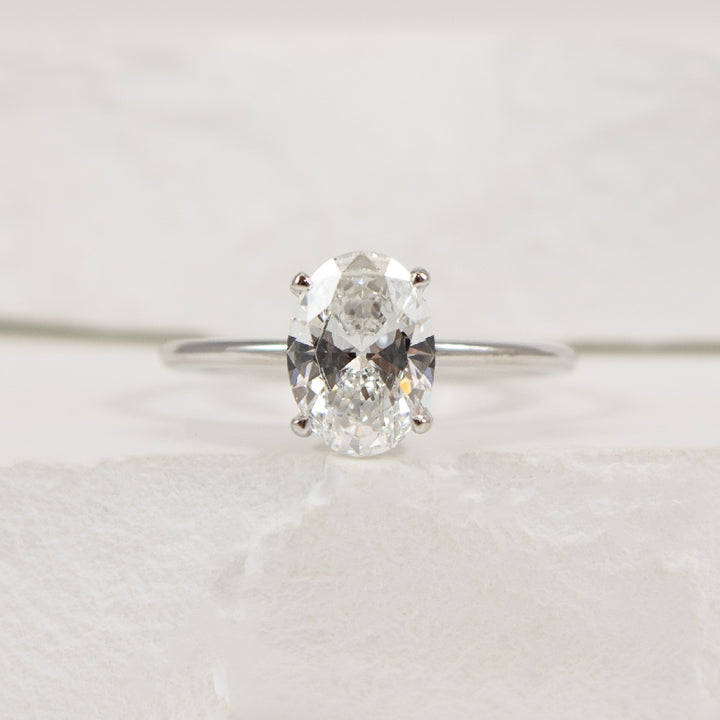 14KW 1.50CT Oval Solitaire Diamond Engagement Ring

14K White Gold Lab Grown Diamond Oval Cut Solitaire Engagement Ring 

Center - 1.50 Carat Oval Cut Lab Grown Diamond of SI1 Clarity, E Colour, Excellent Cut 

Band Width 1.3mm

Finger Size 6