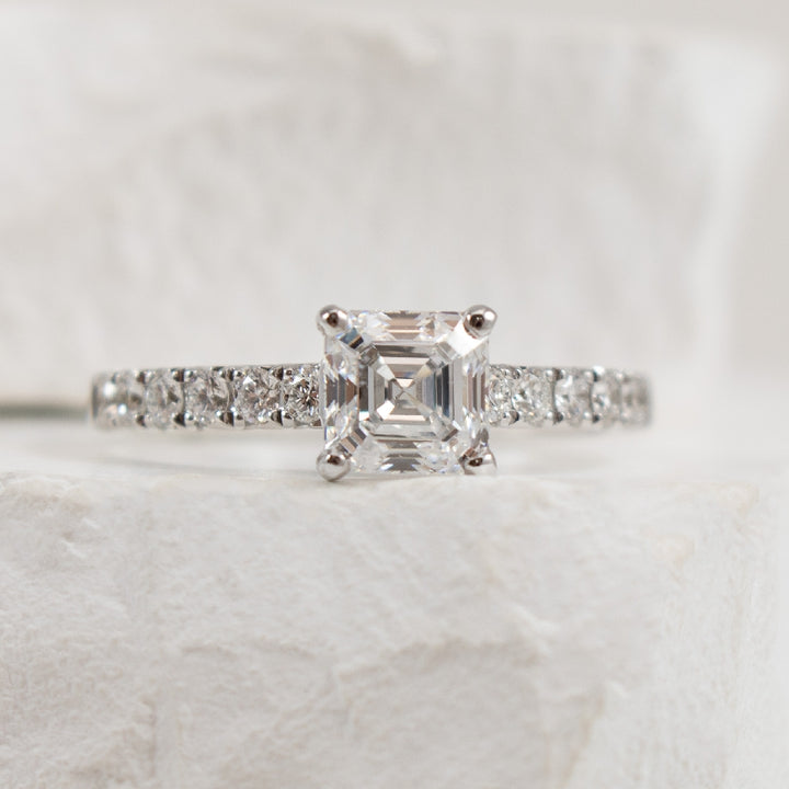 14KY 1.05CT Asscher Cut Diamond Engagement Ring   

14K White Gold Roman & Jules Natural Diamond Asscher Cut Accented Engagement Ring 

Center - 1.05 Carat Asscher Cut Lab Grown Diamond of VS1 Clarity, D Colour, Very Good/ Very Good Cut, IGI Cert