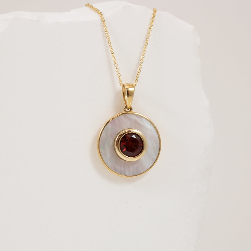 10KY Bezel Set Garnet & Mother of Pearl Necklace    

10K Yellow Gold Garnet & Mother of Pearl Necklace

Chain Length 18' (Adjustable to 17')


