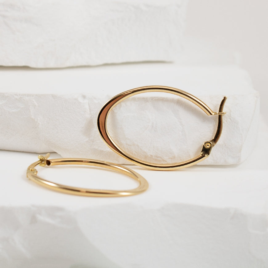 14KY Flat Oval Hoop Earrings                        

14K Yellow Gold Flat Oval Hoop Earrings

Earring Closure Hinged Post

mm Diameter

 Grams

