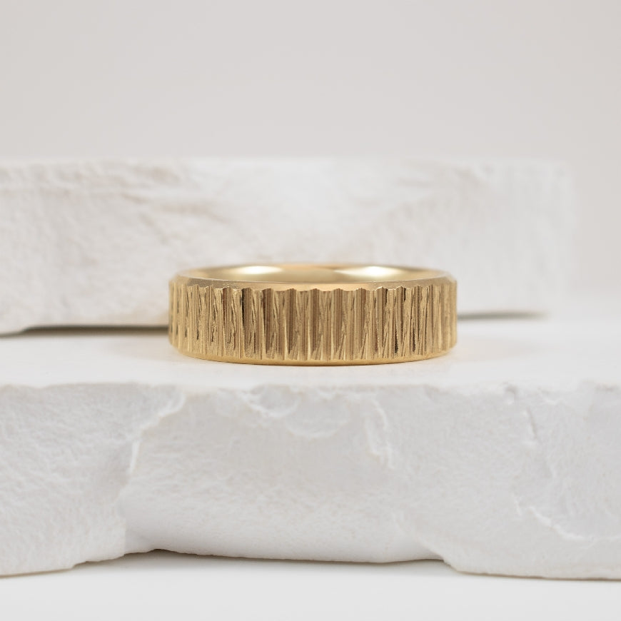 14KY Malo Custom Patterened Comfort 7mm Band      

Malo 14K Yellow Gold Custom Comfort Band

Thickness 2.2mm Comfort Fit

Width 7mm

Finger Size 12.25
