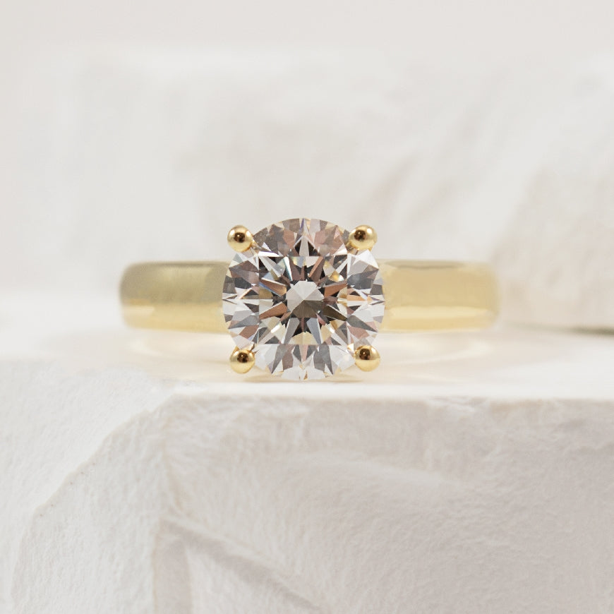 14KY Solitaire 2CT Round Diamond Engagement Ring  

14K Yellow Gold Gabriel & Co. Lab Grown Diamond Round Brilliant Cut Wide Solitaire Engagement Ring

Center - 2.00CT Round Brilliant Cut Lab Grown Diamond of VS+ Clarity, GHI Colour, Very Good Cu