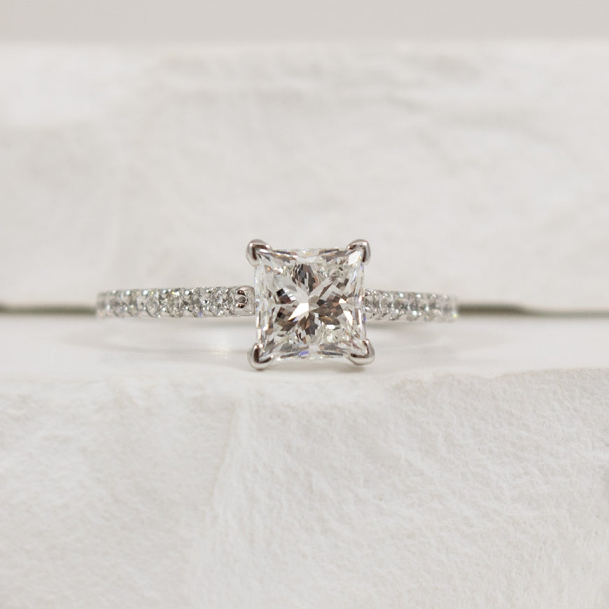 14KW 1.30CT Princess Cut Diamond Accented Ring    

14K White Gold Gabriel & Co. Natural Diamond Accented Engagement Ring

Center - 1.30 Carat Princess Cut Natural Diamond of VS2 Clarity, F Colour, Excellent/Very Good Cut, GIA Certified

Accent
