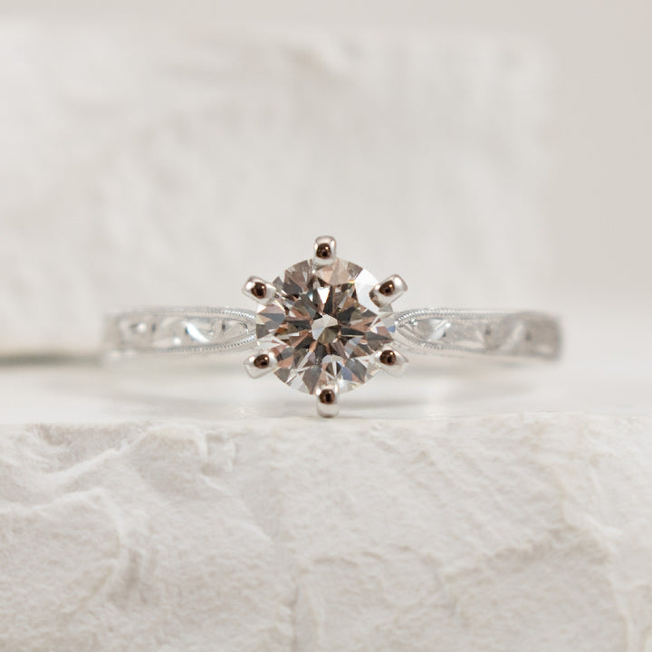 14KW Vintage Style 6 Claw Diamond Engagement Ring 

14K White Gold Gabriel & Co Lab Grown Diamond Solitaire 6 Claw Engagement Ring 

Center - 0.71CT Round Brilliant Cut Lab Grown Diamond of VS1 Clarity, F Colour, Ideal/ Excellent/ Excellent Cut 