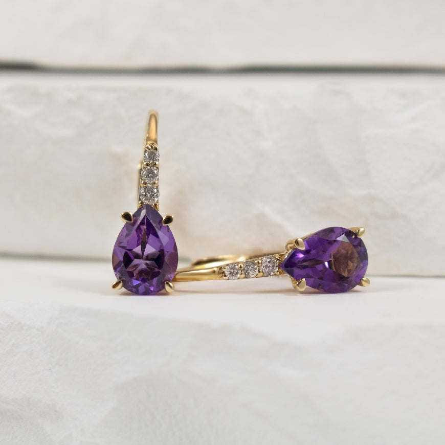 10KY Pear Shaped Amethyst & Diamond Earrings     

10K Yellow Gold Amethyst & Natural Diamond Earrings 

0.065 Total Natural Diamond Weight

Earring Closure Leverback

