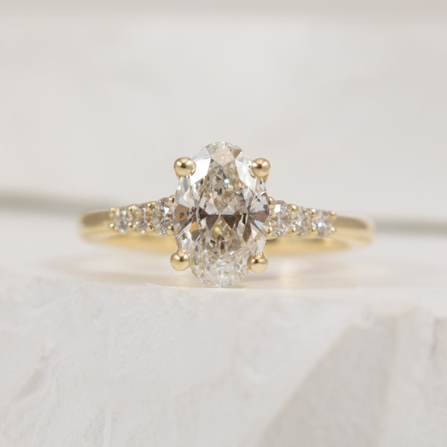 14KY Gabriel & Co. 1.20CT Diamond Engagement Ring 

14K Yellow Gold Gabriel & Co. Oval Cut Natural Diamond Engagement Ring 

Center - 1.20CT Oval Cut Natural Diamond of SI2 Clarity, F Colour, Very Good Cut, GIA Certified 

Accent - 0.21 Total N