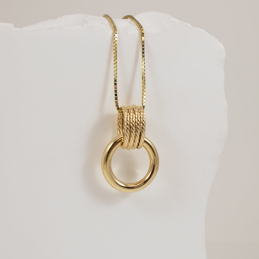 14KY Modern Bold Wrapped Circle Necklace      

14K Yellow Gold Circle Necklace

Chain Length 18'

2.81 Grams
 