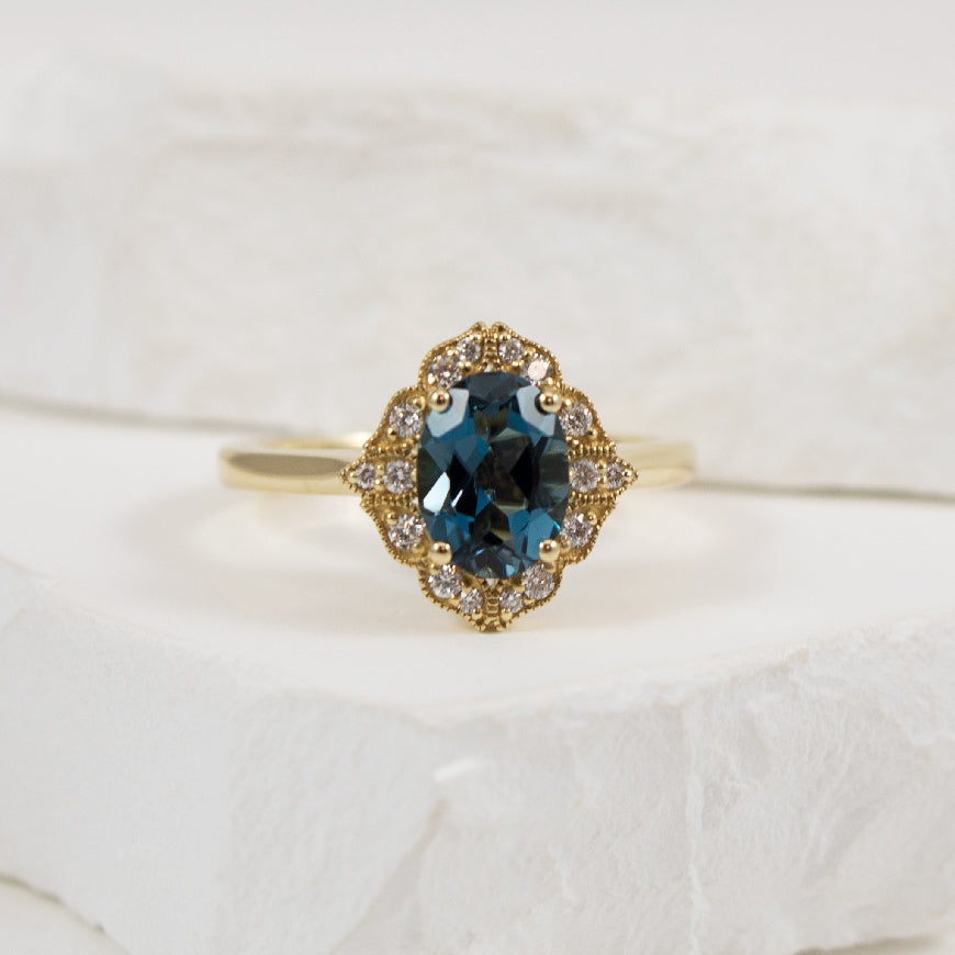 14KY London Blue Topaz & Diamond Vintage Halo Ring

14K Yellow Gold London Blue Topaz & Diamond Ring

1.42 Carat of Natural Oval Cut Blue Topaz 
0.14 Total Natural Diamond Weight SI1-2 Clarity, GH Colour

Finger Size 6.5

