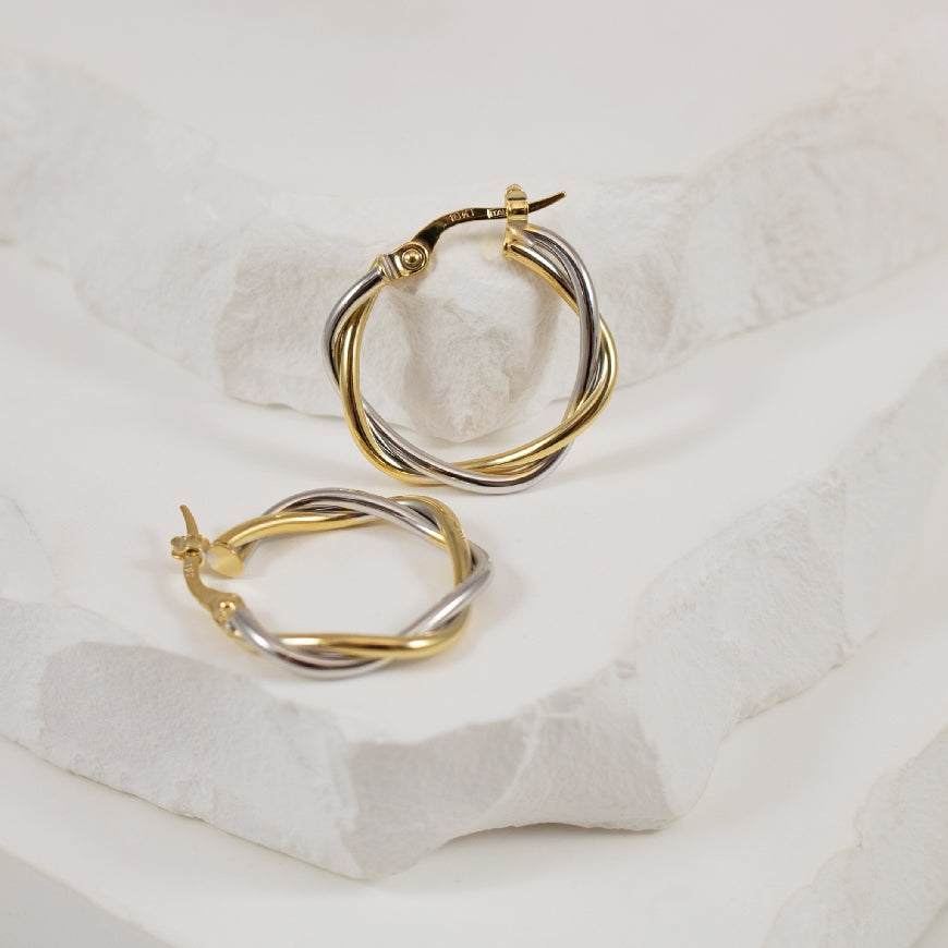 10K Two Tone Gold Twist Hoop Earrings             

10K Yellow & White Gold Twist Hoop Earrings

Earring Closure Hinged Post

15mm Diameter

1.10 Grams