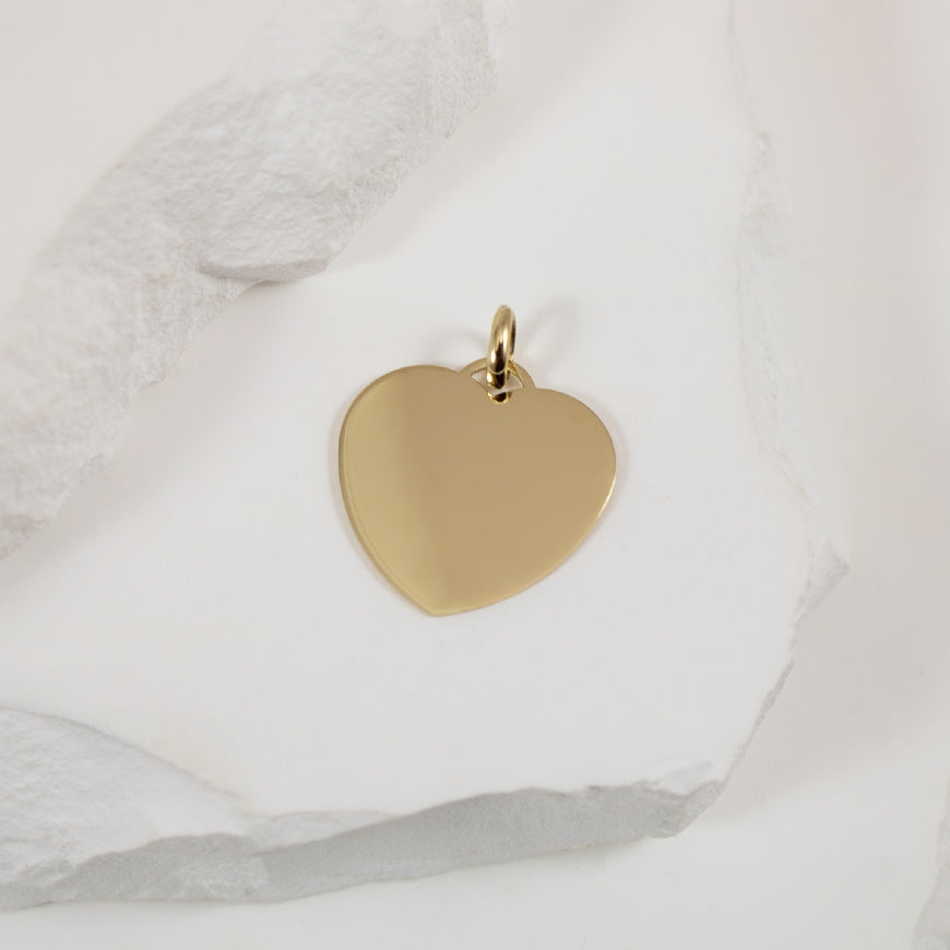 10KY Heart Engravable Pendant                      

10K Yellow Gold Heart Pendant

1.30 Grams

